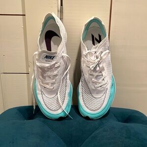 Nike Vaporfly 2 Carbon plated racing shoe. Less than 10 mi.  Women’s 8, men 6.5